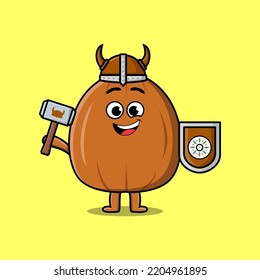 Cute cartoon character Almond nut viking pirate with hat and holding hammer and shield