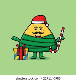 cute cartoon chinese rice dumpling santa clause character is bringing candy cane and boxes christmas