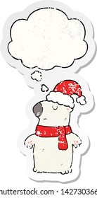 cute cartoon christmas bear with thought bubble as a distressed worn sticker