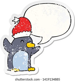 cute cartoon christmas penguin with speech bubble distressed distressed old sticker