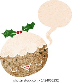 cute cartoon christmas pudding with speech bubble in grunge distressed retro textured style