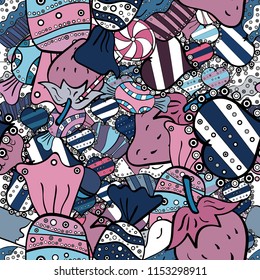 Cute cartoon colorful seamless vector pattern with candies and cotton candy. Candies on blue, black and white colors. Vector.