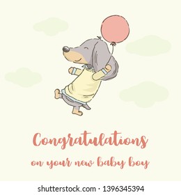 Cute cartoon Dachshund with text congratulations on your new baby boy