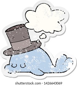 cute cartoon dolphin with thought bubble as a distressed worn sticker