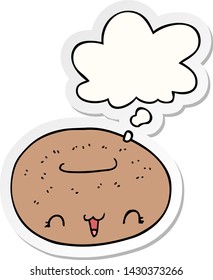 cute cartoon donut with thought bubble as a printed sticker