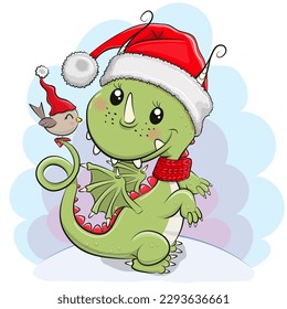 Cute Cartoon Dragon in Santa hat with a BIrd on a Blue background