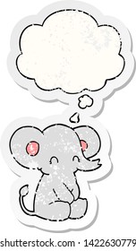 cute cartoon elephant with thought bubble as a distressed worn sticker