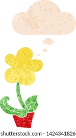 cute cartoon flower with thought bubble in grunge distressed retro textured style
