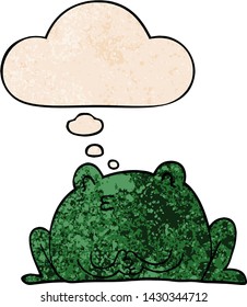 cute cartoon frog with thought bubble in grunge texture style