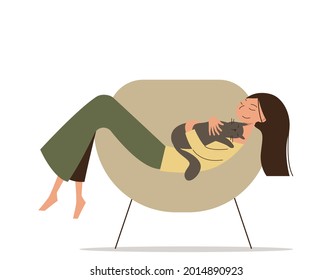 Cute cartoon girl with a long hair lies on the chair with her cat. Happy young woman hugs a pet.