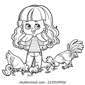 Cute cartoon girl girl with wavy hair feeds grains to hens and chickens outlined for coloring page on white background