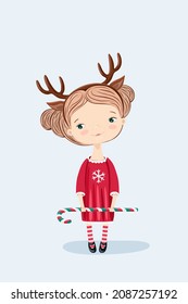 Cute cartoon girl in winter deer costume and  candy cane
