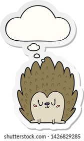 cute cartoon hedgehog with thought bubble as a printed sticker
