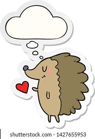 cute cartoon hedgehog with thought bubble as a printed sticker