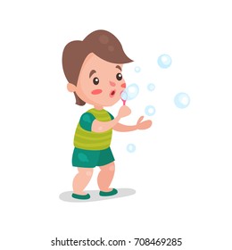 Cute cartoon little boy blowing and playing with soap bubbles vector Illustration