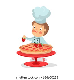 Cute cartoon little boy chef character baking strawberry cake vector Illustration