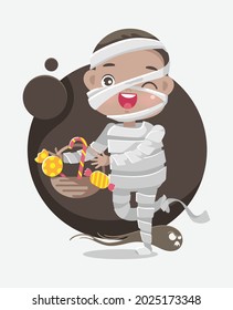 Cute cartoon little boy in mummy costume with basket for sweets trick or treat in halloween.
