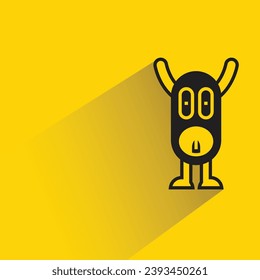 cute cartoon monster icon with shadow on yellow background