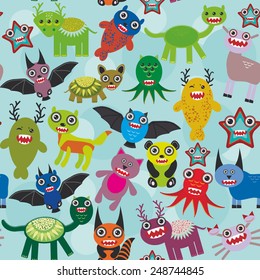 Cute cartoon Monsters seamless pattern on blue background. Vector