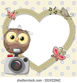 Cute cartoon Owl with a camera and a heart frame
