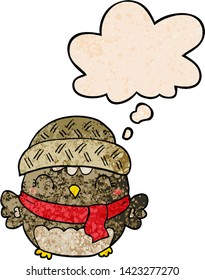 cute cartoon owl in hat with thought bubble in grunge texture style