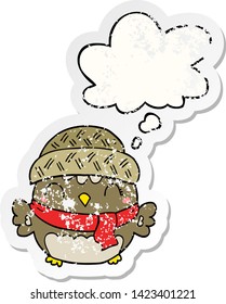 cute cartoon owl in hat with thought bubble as a distressed worn sticker