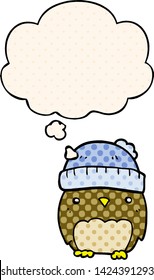 cute cartoon owl in hat with thought bubble in comic book style