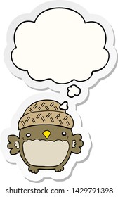 cute cartoon owl in hat with thought bubble as a printed sticker