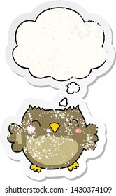 cute cartoon owl with thought bubble as a distressed worn sticker