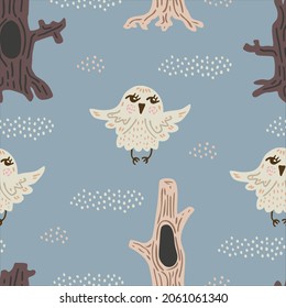 Cute cartoon owls. Forest baby pattern on blue-gray background. Pastel seamless wallpaper for nursery. Northern magic bird flies between old tree trunks. Soulful illustration of kind animal for kids. 