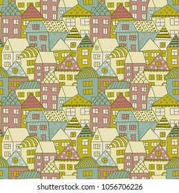 Cute cartoon pattern with tiny houses and trees. Hand drawn seamless ornament with hand drawn town.