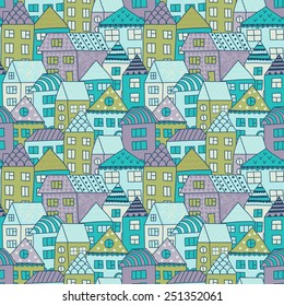 Cute cartoon pattern with tiny houses and trees. Hand drawn seamless ornament with hand drawn town