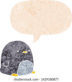 cute cartoon penguin with speech bubble in grunge distressed retro textured style