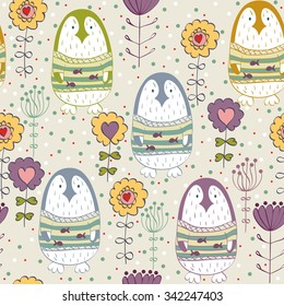 Cute cartoon penguin in  spring flowers. Seamless pattern