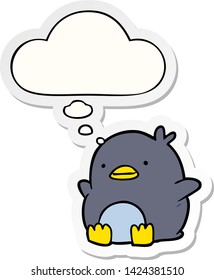cute cartoon penguin with thought bubble as a printed sticker