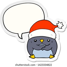 cute cartoon penguin wearing christmas hat with speech bubble sticker