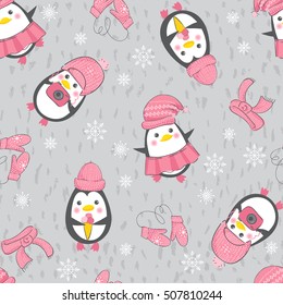 Cute cartoon penguins in winter funny pink hats on gray background. Vector seamless pattern.