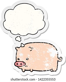 cute cartoon pig with thought bubble as a distressed worn sticker