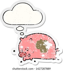 cute cartoon pig with thought bubble as a distressed worn sticker