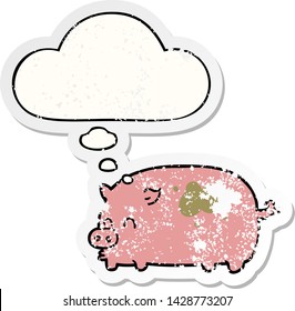 cute cartoon pig with thought bubble as a distressed worn sticker