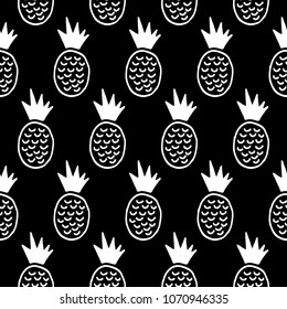 Cute cartoon pineapple print with hand drawn pineapples. Sweet vector black and white pineapple print. Seamless monochrome doodle pineapple print for fabric, wallpapers, wrapping paper and cards.