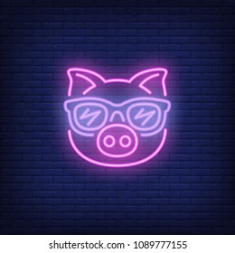 Cute cartoon pink pig in sunglasses. Neon sign element. Night bright advertisement. Vector illustration for restaurant, cafe, diner, menu, advertising design