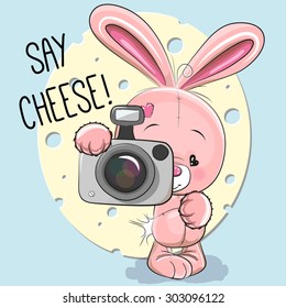 Cute cartoon Rabbit with a camera on a gray background
