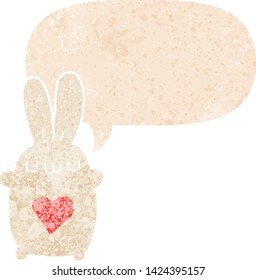 cute cartoon rabbit with love heart with speech bubble in grunge distressed retro textured style