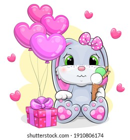 Cute cartoon rabbit and pink gift with balloons. Vector illustration of an animal.