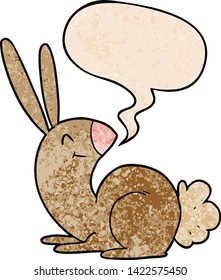 cute cartoon rabbit with speech bubble in retro texture style