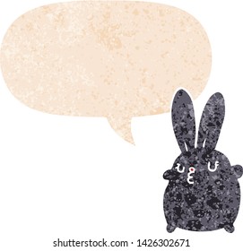 cute cartoon rabbit with speech bubble in grunge distressed retro textured style