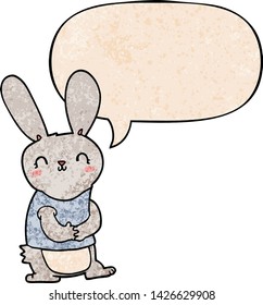 cute cartoon rabbit with speech bubble in retro texture style