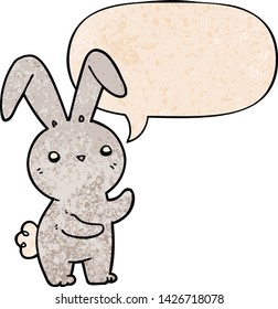 süßes Cartoon-Kaninchen mit Sprachblase im Retro-Stil