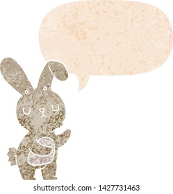 lindo conejo de dibujos animados con burbuja de habla en un estilo retro angustiado estilo texturizado